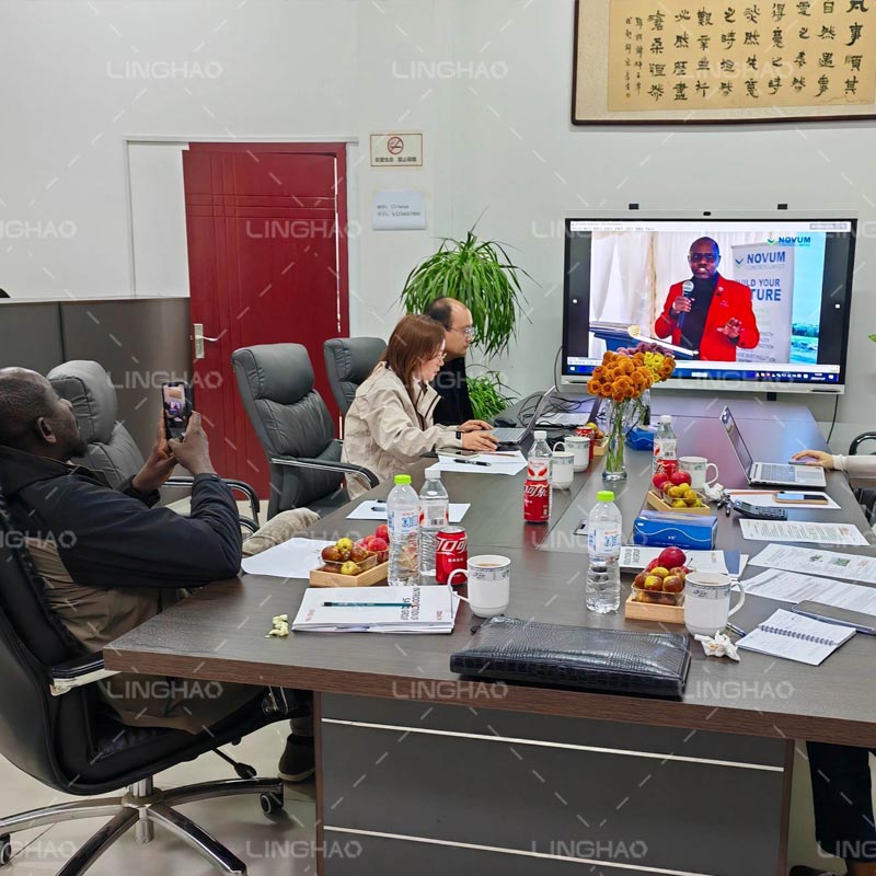 Friendly meeting in SanqGroup conference room with fresh fruit, discussing final payment and installation plans