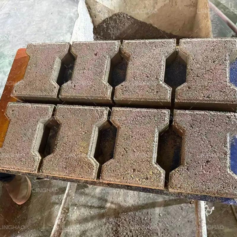 Finished QTJ4-40 machine ready for consolidation shipment at port—compact size ideal for small factories