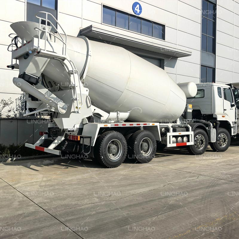 Customer exploring woodworking machinery and construction trucks during the factory tour