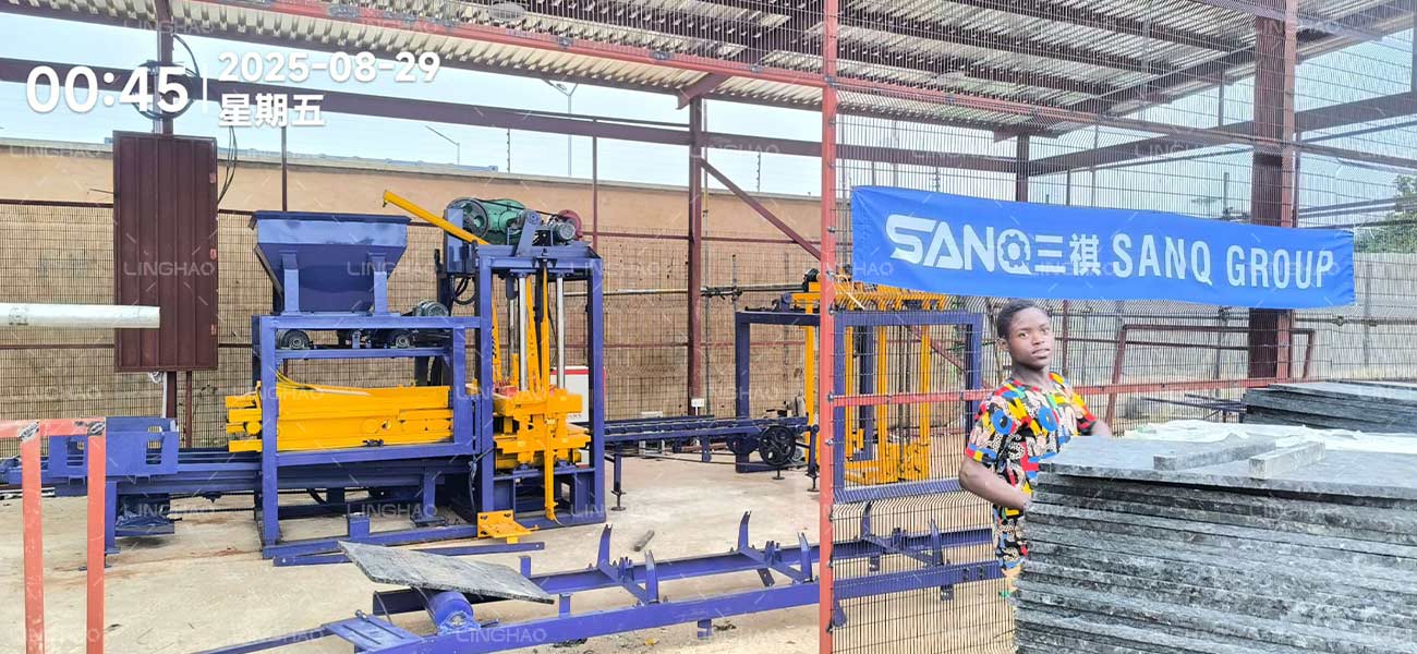 SanqGroup engineer manager installing and testing QT4-15 block machine at customer's plant in Nigeria