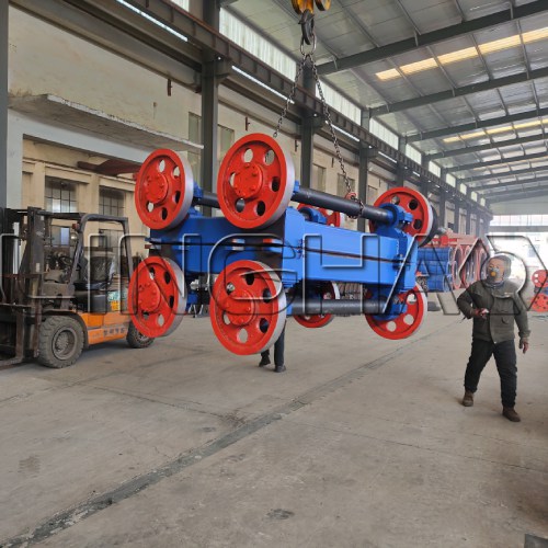 Workers loading concrete pole production line equipment into containers at SanqGroup yard on February 3, 2026