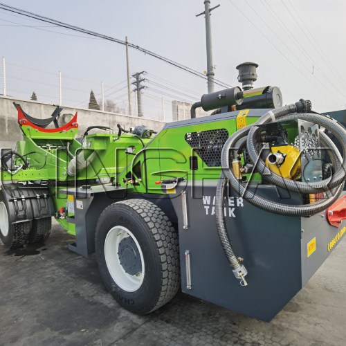 Team securing the mixer truck in container with reinforced straps and protective padding for safe ocean transit to Philippines
