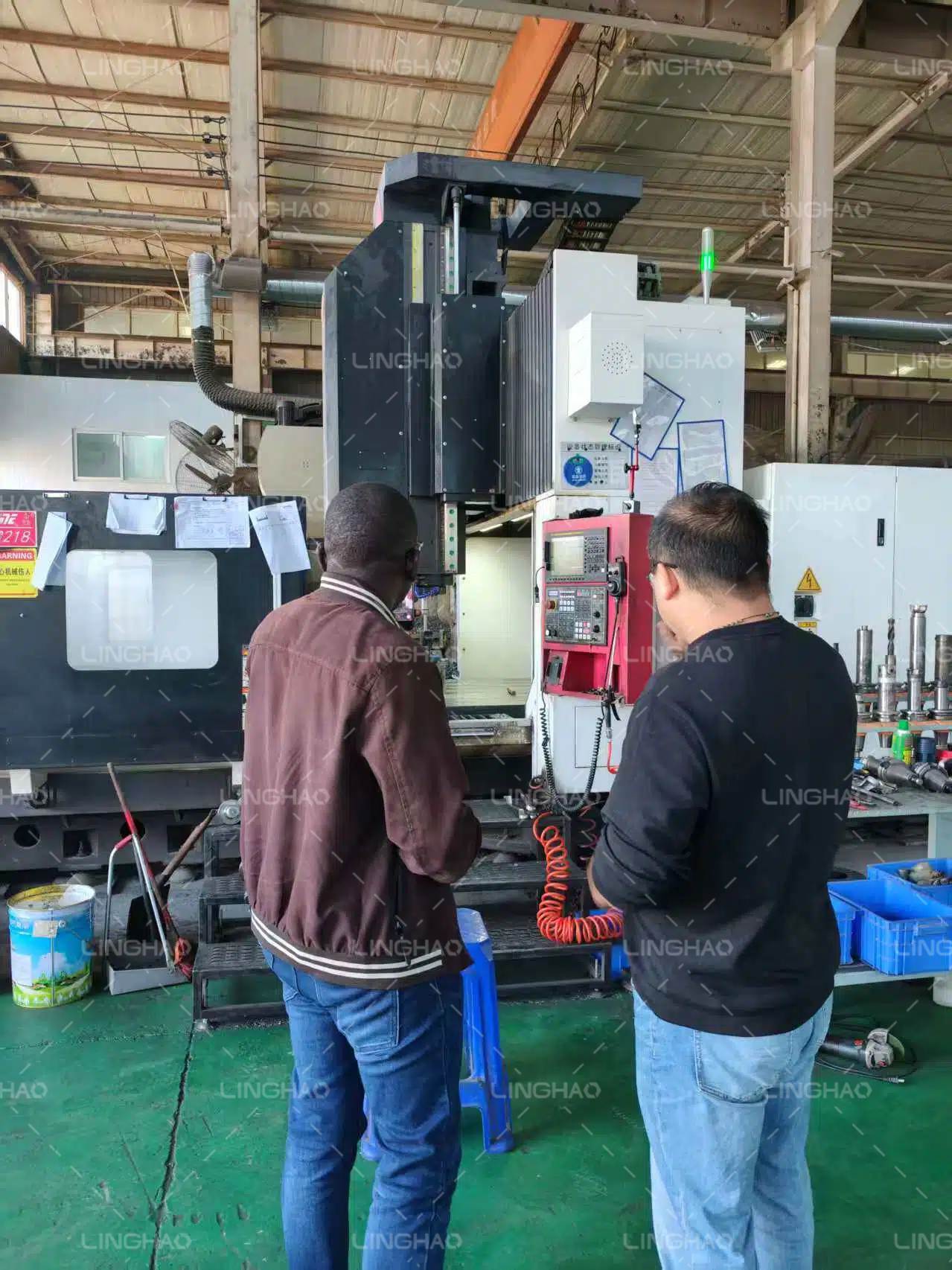 Technical team discussing customization requirements for long-distance transport and rough terrain in Uganda