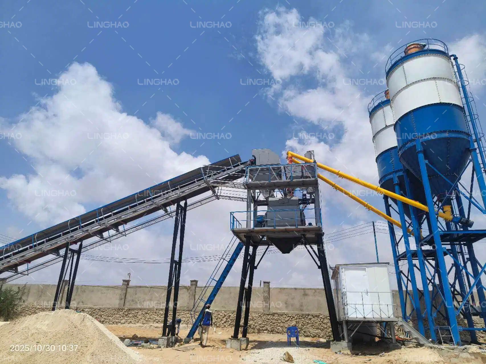 SanqGroup engineers installing HZS60 concrete batching plant foundation in Somalia under challenging site conditions