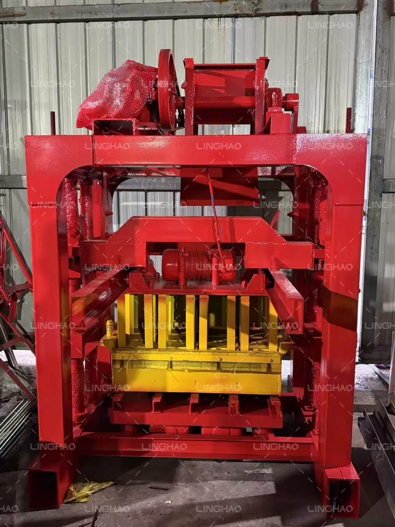 QT4-35 brick machine wrapped in dustproof film and labeled for Ugandan customer at SanqGroup factory