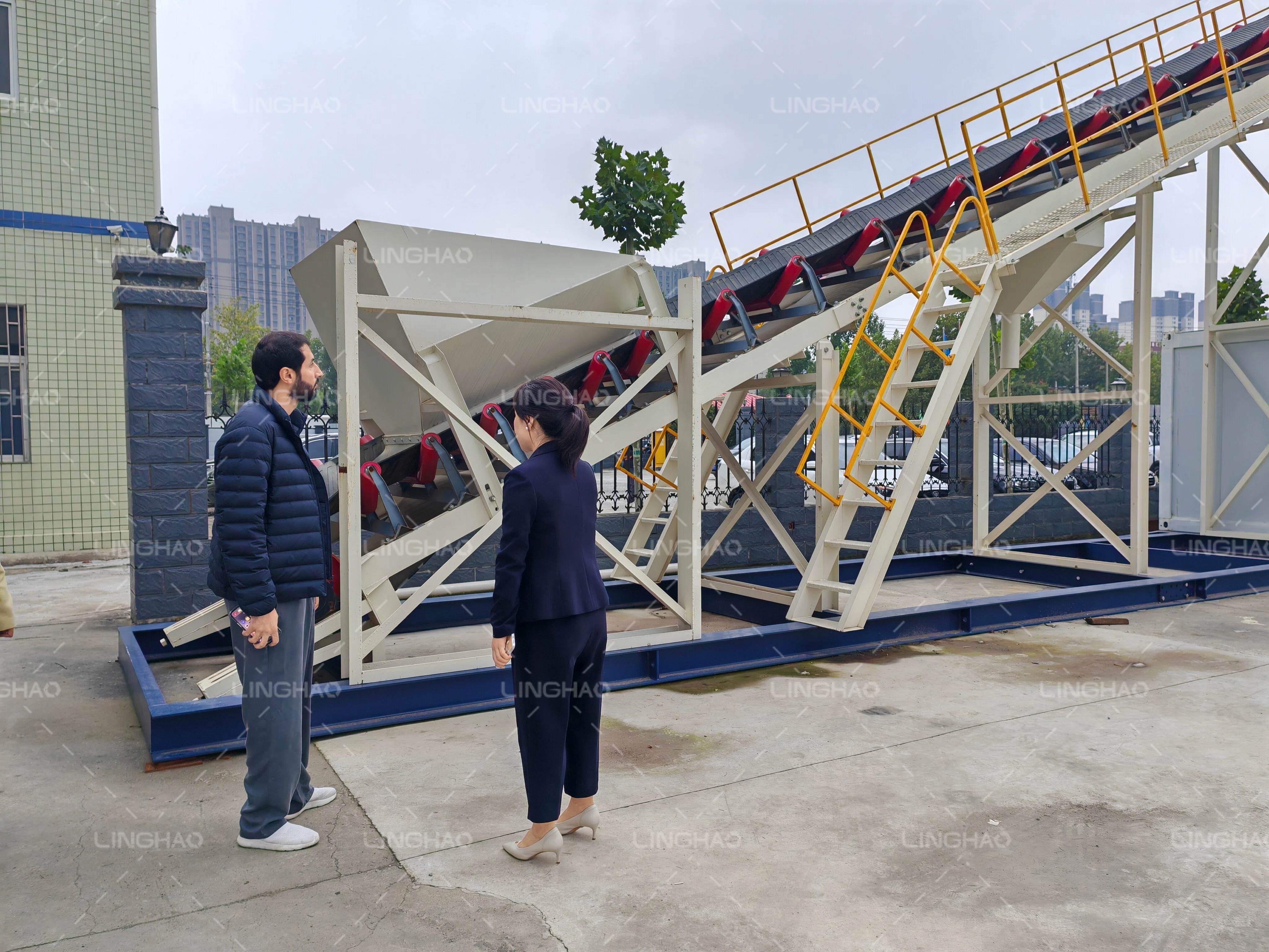 UAE client inspecting the 180m³/h concrete batching plant control system at SANQ Group factory